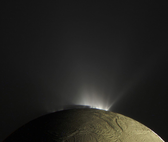 Saturn’s moon Enceladus with a plume. Image credit: NASA / JPL-Caltech / SSI / Kevin M. Gill.