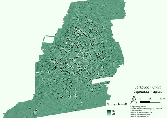 The site of Jarkovac in Serbia has a surface area of up to 13 ha and is surrounded by four to six ditches. The deep black angular anomalies indicate a large number of burnt houses. Image credit: Cluster ROOTS / Museum of Vojvodina Novi Sad / National Museum Zrenjanin / National Museum Pančevo.