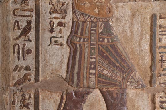 The king’s apron with plant decoration: the papyrus (top) is the emblem of Lower Egypt and the lily (bottom) the emblem of Upper Egypt. Image credit: Ahmed Amin / Ministry of Tourism and Antiquities.